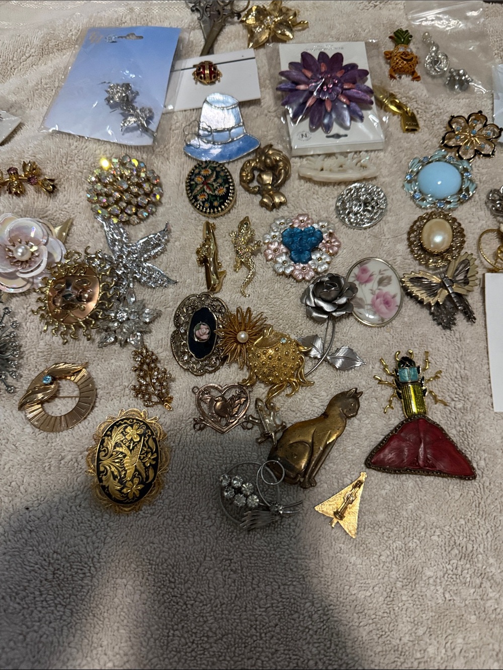 Assorted Vintage Women’s Brooches and Pins - Gold, Silver, Purple, Blue, Red